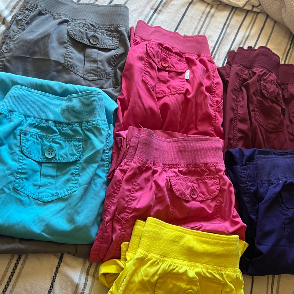 7 pairs of Peaches Scrub pants